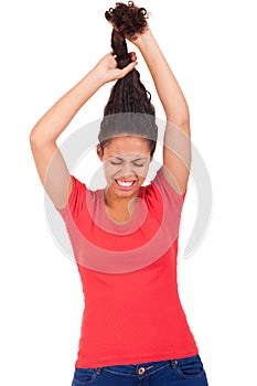 Young african american woman combing hair