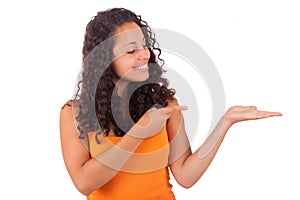 Young african american woman displaying something