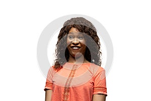 Young african-american woman with funny, unusual popular emotions and gestures isolated on white studio background