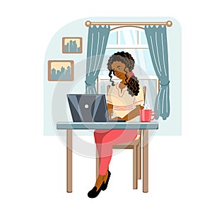 Young african american woman with laptop working from home. Girl sitting in modern interior. Home office concept. People who study