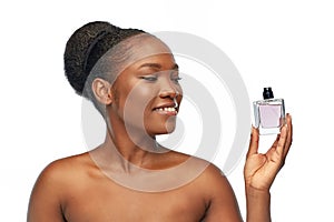 Young african american woman with perfume