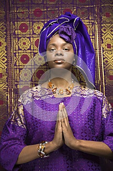 Young African American Woman Praying and Wearing T