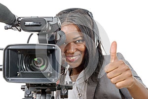 Young African American woman with professional video camera