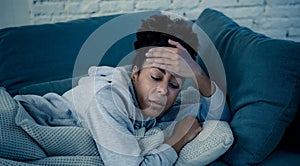 Young african american woman suffering from depression, anxiety and mental health illness