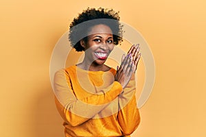 Young african american woman wearing casual clothes clapping and applauding happy and joyful, smiling proud hands together