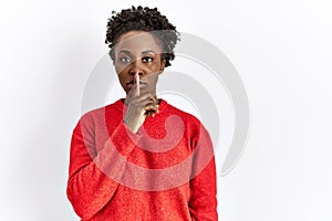 Young african american woman wearing casual clothes over isolated background asking to be quiet with finger on lips