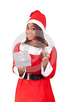 Young African American woman wearing a santa hat