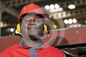Young African American Worker In Personal Protective Equipment Looking At Camera