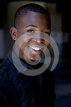 Young african boy looking to the camera