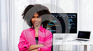 Young African IT developer with smiling and looking at camera. Tastemaker.