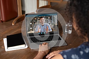 Young african ethnicity businesswoman holding video call conversation.