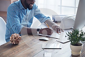 Young african man working in the office business