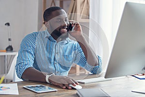 Young african man working in the office business