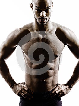 Young african muscular build man topless silhouette