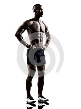 Young african shirtless muscular build man standing silhouette