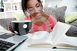 Young African student learning at home