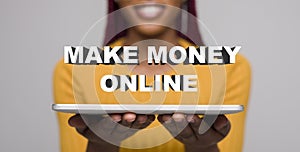 Young african woman Making money online easily with laptop