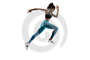 Young african woman running or jogging isolated on white studio background.