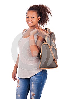 Young African woman travelling with her bag - isolated over whit