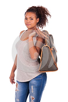 Young African woman travelling with her bag - isolated over whit