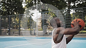 Young Afro American Athlete has Basketball Training. Caucasian Guy Dribbling a Ball, Throwing and Scoring on the Urban