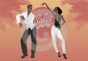 Young afro american couple dancing salsa.