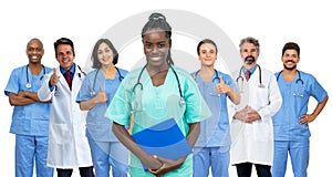 Young afro american female nurse with doctor and medical team