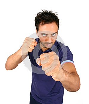 Young Aggressive Man Show His Fists photo