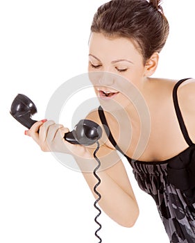 Young alluring girl calling at the phone