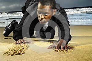 Young amn on beach crawling