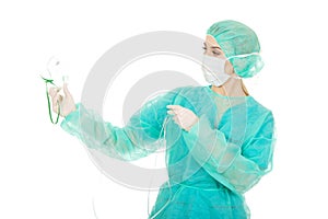 Young anesthesiologist woman holding an oxygen mask