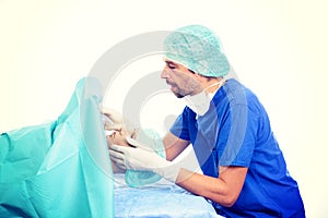 Young anesthetist with larynx mask and patient