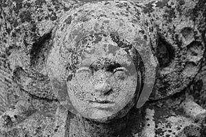 Young angel bas relief on historic cemetery in Lommel, Belgium