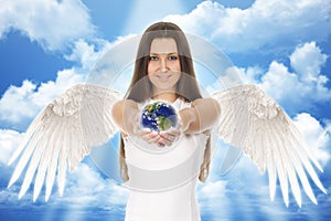 Young angel woman holding Earth in hands with clouds