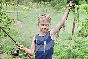 Young angler with tackle perch killer