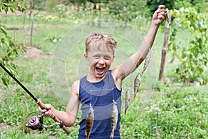 Young angler with tackle perch killer