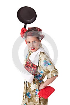 Young angry woman with frying pan.