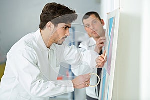 young apprentice painter in professional training