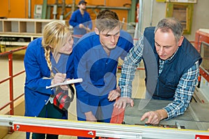 young apprentices in metalworkshop