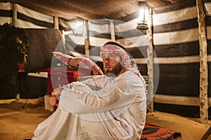 Young arab man in his house