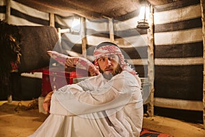 Young arab man in his house