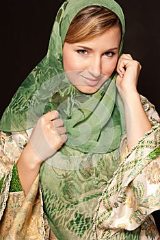 Young arab woman with veil close-up portrait