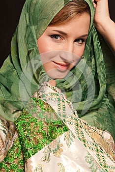 Young arab woman with veil close-up portrait