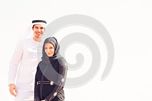 Young Arabian Couple In The Desert