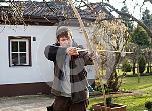 Young archer training with the bow