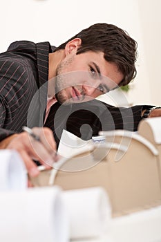 Young architect working at office