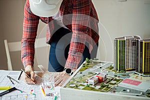 Young architect working on an office desk