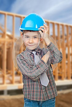 Young arhitect with helmet greets