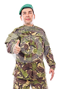 Young army soldier with thumb up