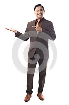 Young Asia Businessman Pointing To His Side